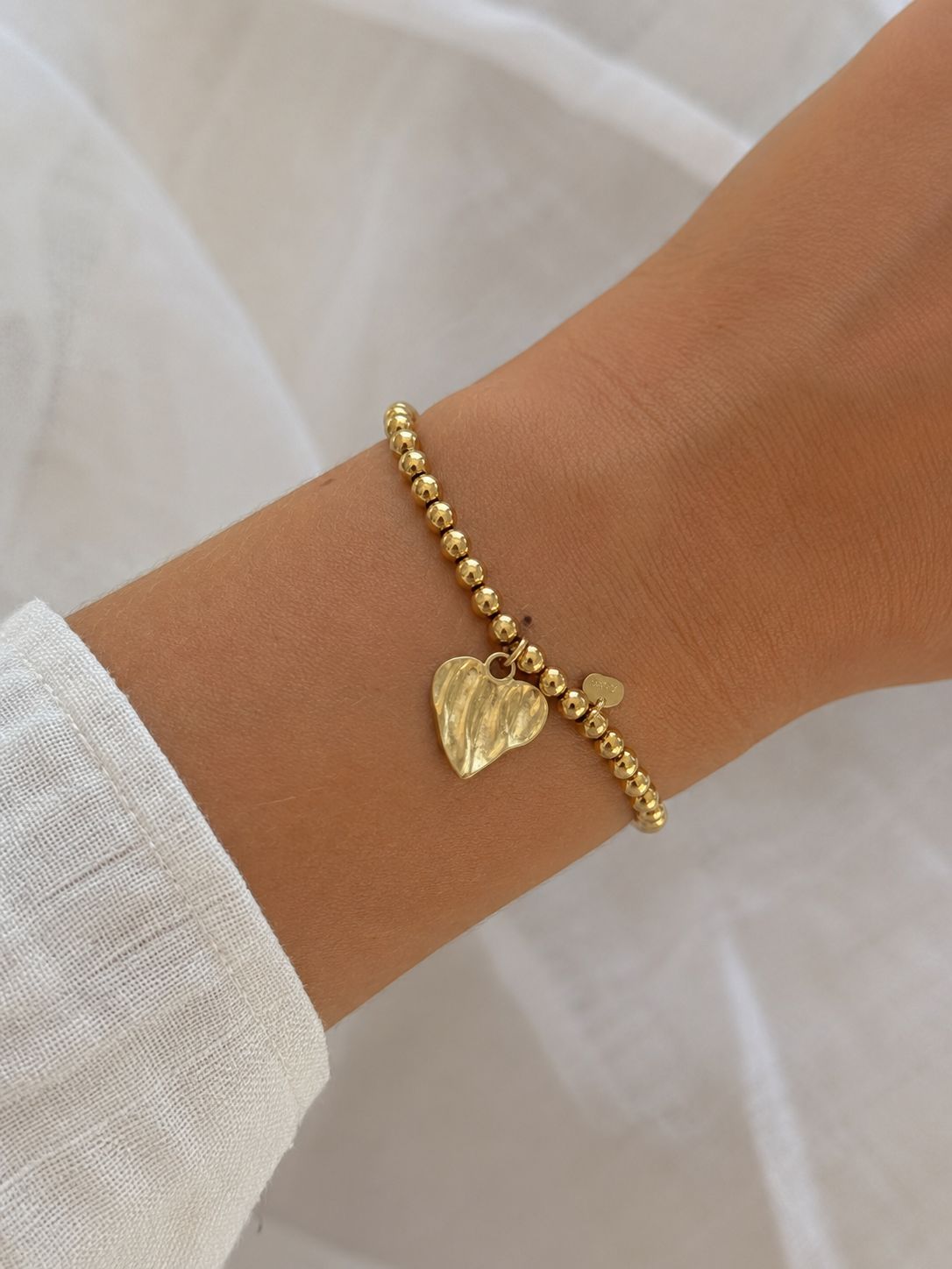 Bracelet perle doré